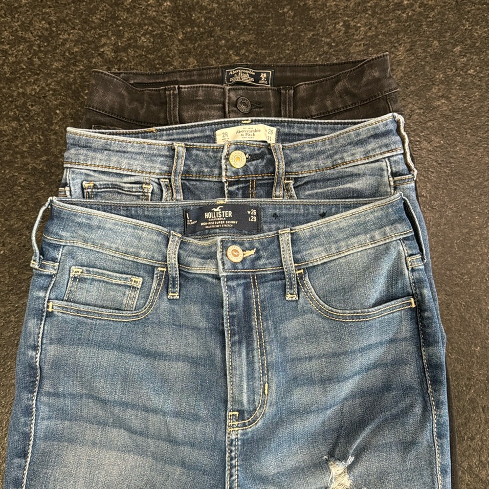 Three pairs of Hollister and Abercrombie and Fitch skinny jeans